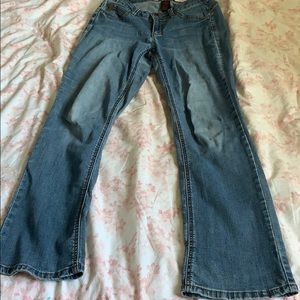 Size 6 boot cut medium wash skinny jeans